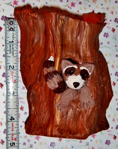 handmade_polymer_clay_raccoon_in_a_hollow_log_sculpture_container_e4dc9cf8